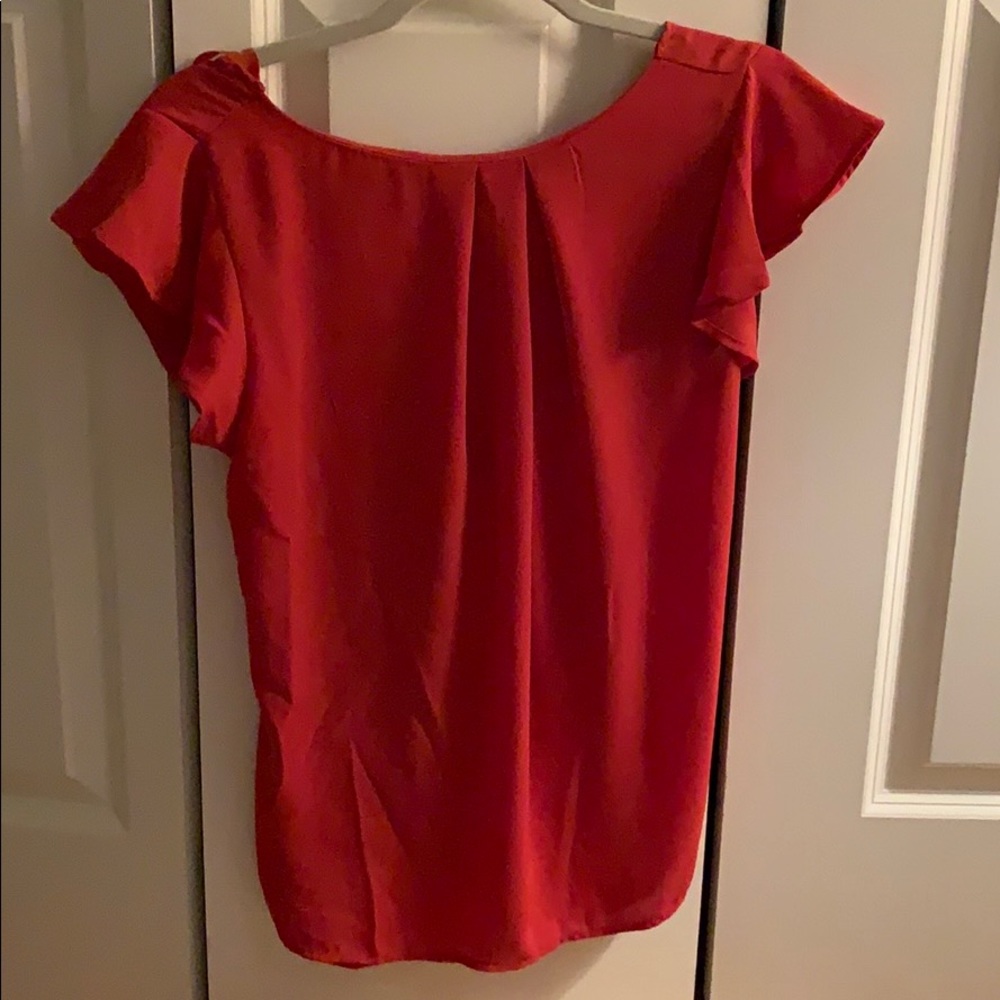 Coral work top with tie back and flutter sleeves